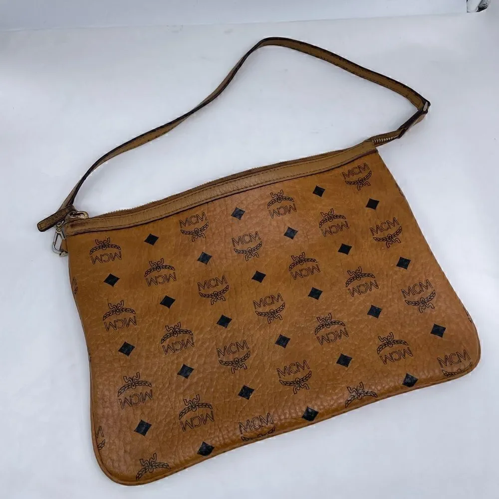 MCM authentic Cognac visetos zip Pouch entrupy COA